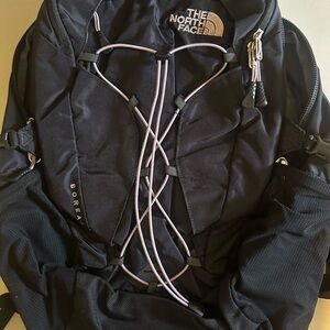 The North Face Black Backpack with Purple Accents